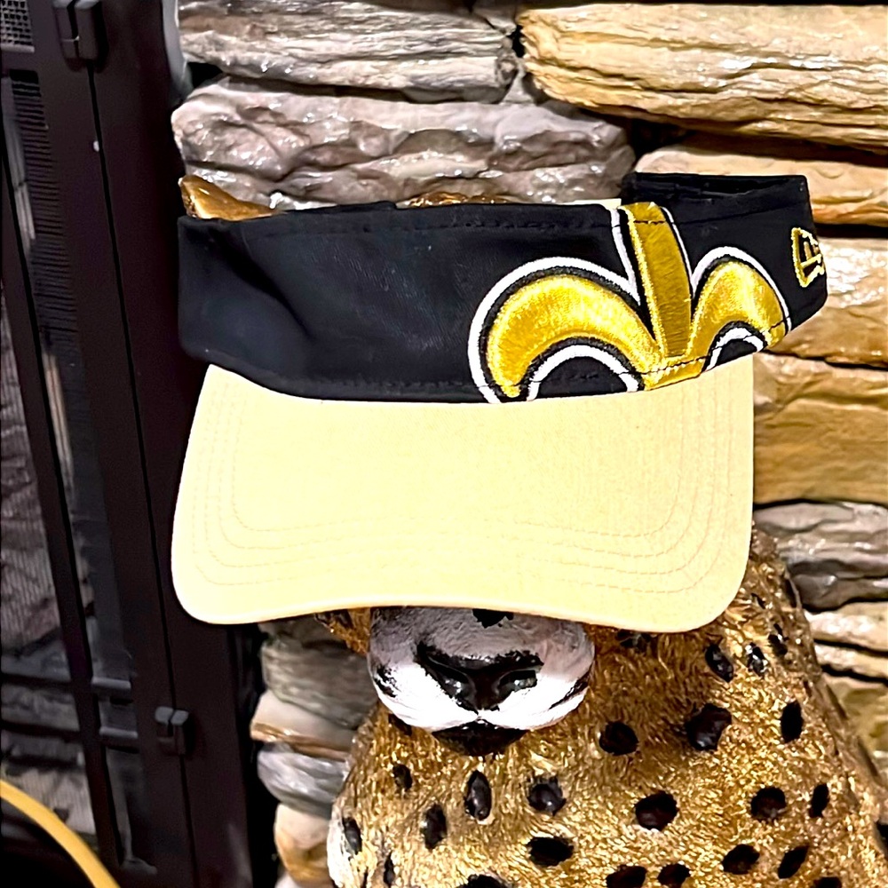 NFL Store. Saints Fleur De Lis Black and Gold. NWOT Visor. Adjustable.